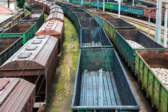 Many Trains With Cargo Wagons