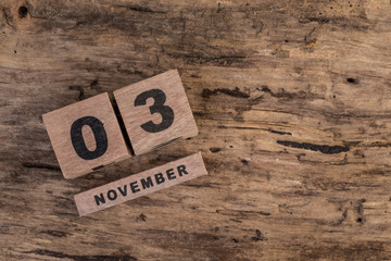 wooden calendar for november on wooden surface