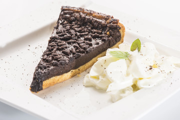 Chocolate tart on white background