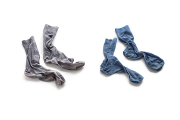 Clean laundered men's socks on a white background