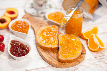 Obraz na płótnie Canvas Slices of bread with jam