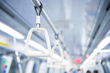 handle for standing passenger inside subway train