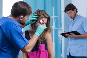Woman with wound on head