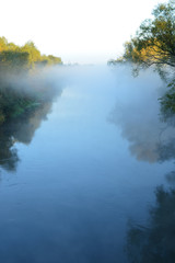 Obraz na płótnie Canvas River in the fog