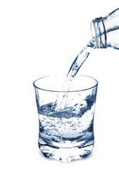 Splash water in a glass isolated on a white background