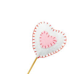Heart on a stick, Valentine's Day background on white. Selective focus.