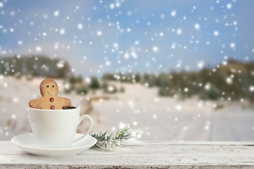 coffee cup on a snowy day window background