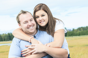 Young happy couple on summer season