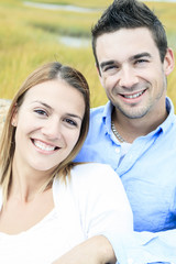 Young happy couple on summer season