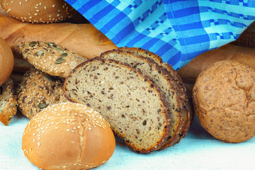 Assortment of bread and tablecloth