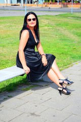 Fototapeta na wymiar Woman in black in the Vilnius city