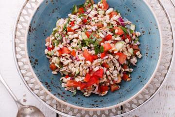 Salad with pearl barley and vegetables.selective focus