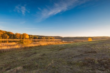 Fototapeta premium Beautiful autumnal sunset landscape