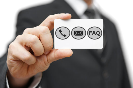 businessman hold business card with phone,email and FAQ icon