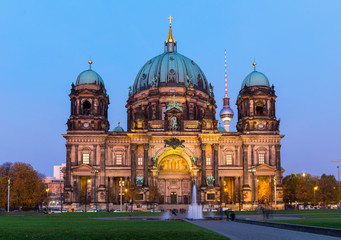 Berlin Cathedral with TV tower in the background at night