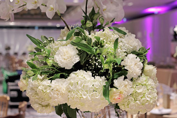 Hydrangea, roses and orchid bouquet. White wedding table flower decoration. Glamorous Event,...