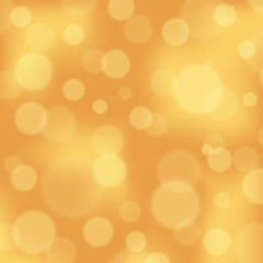 Gold color bokeh vector background. Blurred light background with bokeh effect. Defocused backdrop in the color of christmas and ornaments. 