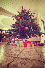 Close up of beautiful christmas tree with red decoration