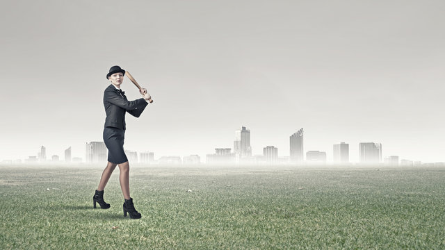 Woman with baseball bat