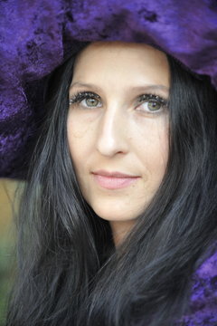 Woman dressed as a witch.
