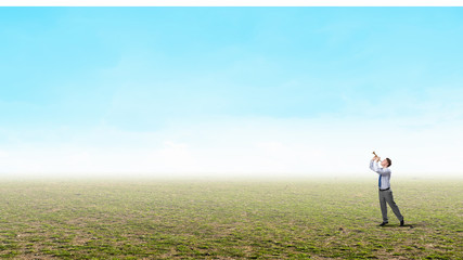 Businessman play pipe