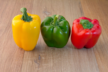 Three colorful sweet peppers