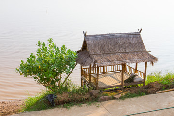 Fototapeta na wymiar Small hut near river