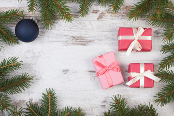 Wrapped gifts for Christmas and spruce branches, copy space for text