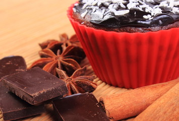 Muffins with desiccated coconut, chocolate, anise and cinnamon