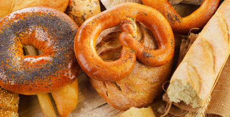 Fresh bread on a rustic wooden table.