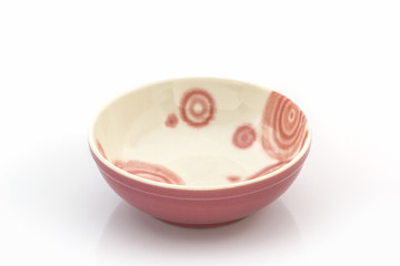 Empty red ceramic bowl.