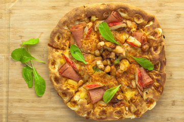 Hot Pizza Top View with Pineapple, Ham and Bell Pepper