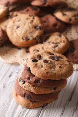 stack of chocolate chips cookies macro on a table. Vertical
