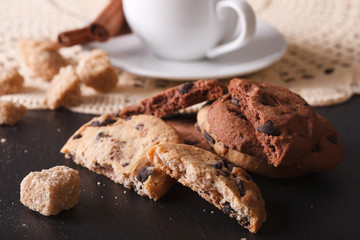 Chocolate chips cookies close-up on a stone table. horizontal
