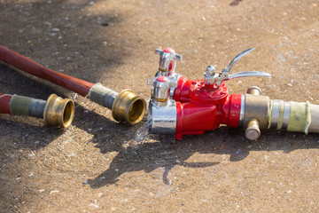 Fire Water hose connector on the ground