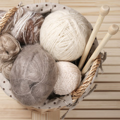 Fototapeta na wymiar Knitting set in basket