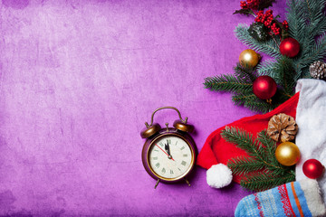 Alarm clock on christmas background