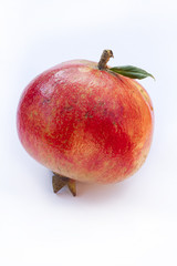 Single Pomegranate Isolated On White, closeup