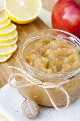 Homemade apple and lemon jam with ginger and nutmeg, closeup, selective focus