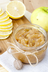 Homemade apple and lemon jam with ginger and nutmeg, closeup, selective focus