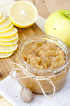 Homemade apple and lemon jam with ginger and nutmeg, closeup, selective focus