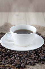 Coffee cup and coffee beans