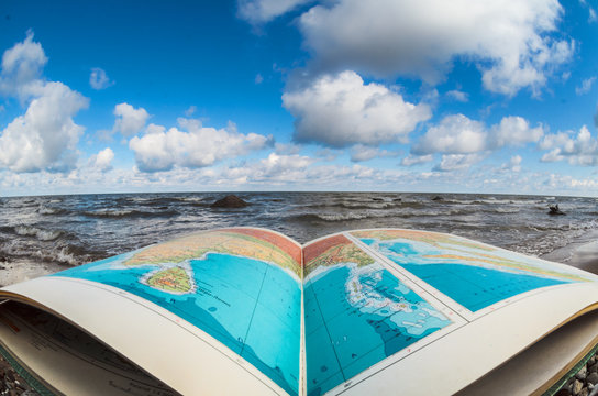 Atlas Book At Seashore