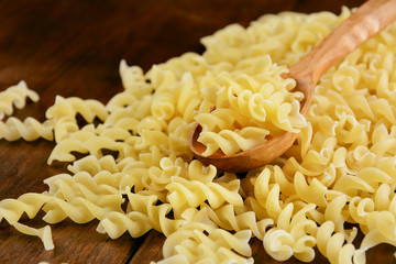 Raw fusilli pasta background