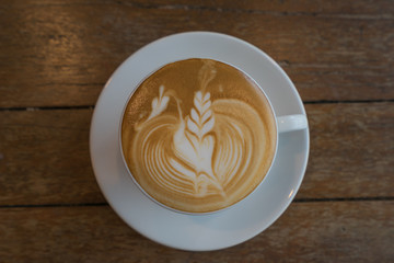 Tail bird heart latte art coffee