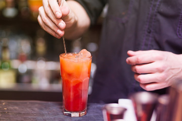Barman stir alcohol 