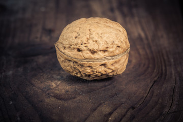 Walnuts on a wooden table.