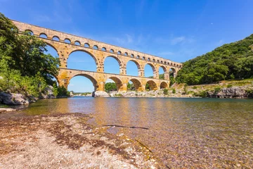 Photo sur Plexiglas Pont du Gard Three-tiered aqueduct Pont du Gard