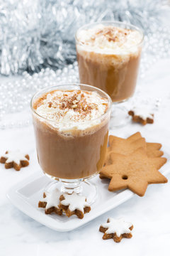 festive pumpkin latte and almond biscuits, top view