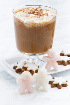 festive spiced pumpkin latte and almond cookies, closeup
